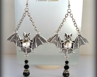 Inverted Crucifix earrings with black glass crystal teardrops. Classic gothic dangling ornamental satanic earrings