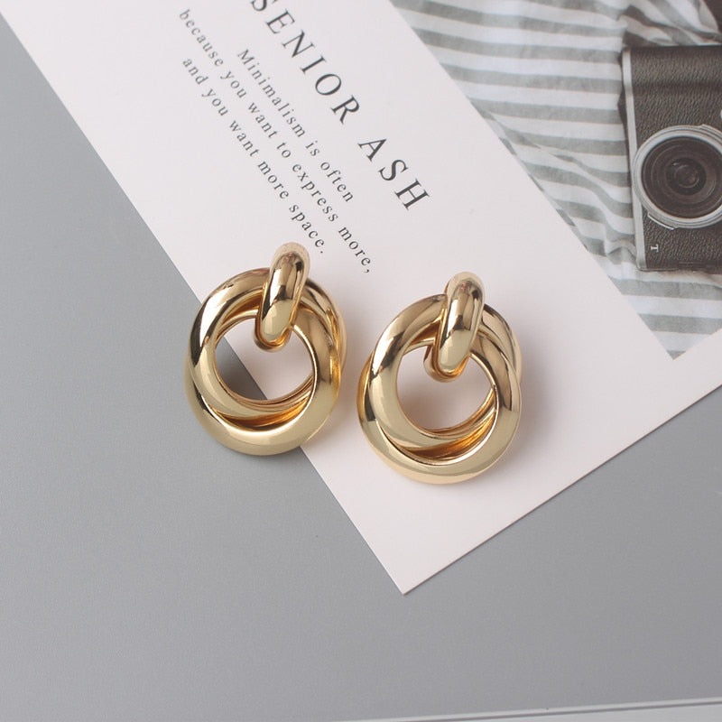 Twist Metal Stud Earrings for Women Hollow Geometric Statement Gold Color Earrings Personality Unusual Earrings Trend Brincos