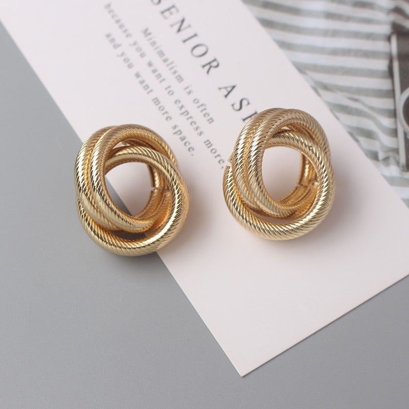 Twist Metal Stud Earrings for Women Hollow Geometric Statement Gold Color Earrings Personality Unusual Earrings Trend Brincos