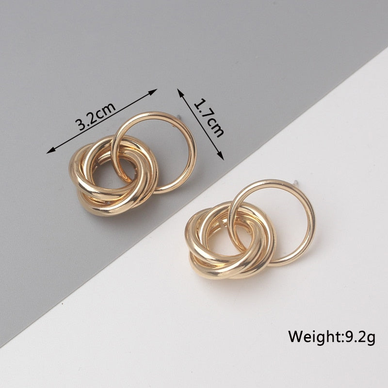 Twist Metal Stud Earrings for Women Hollow Geometric Statement Gold Color Earrings Personality Unusual Earrings Trend Brincos