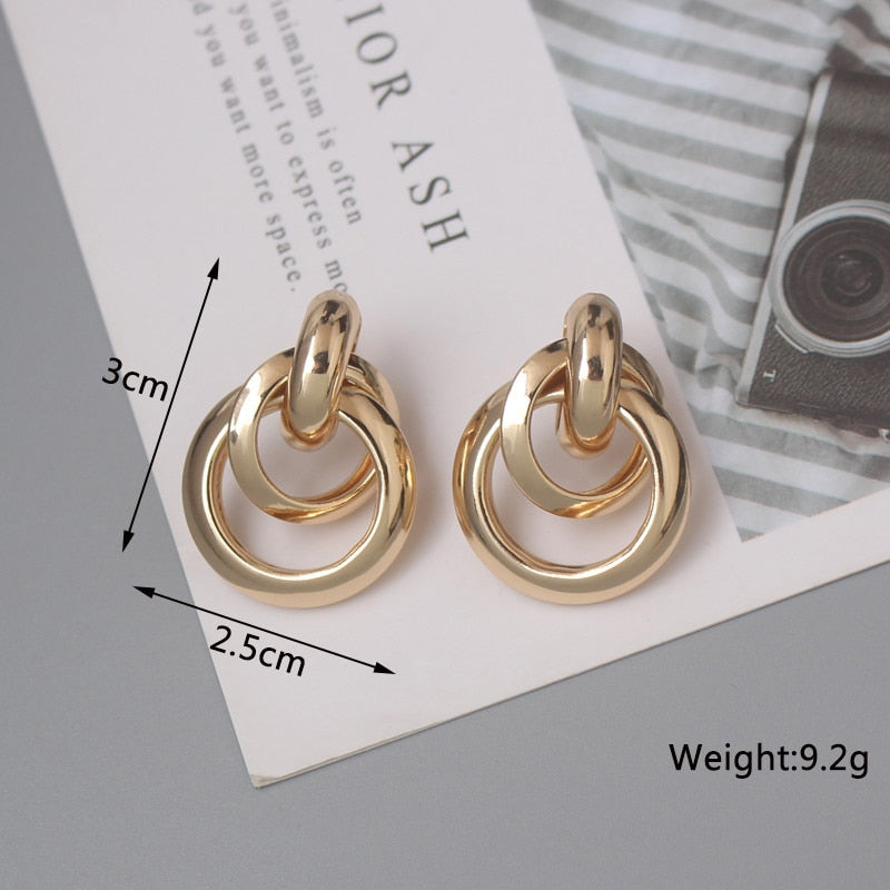 Twist Metal Stud Earrings for Women Hollow Geometric Statement Gold Color Earrings Personality Unusual Earrings Trend Brincos