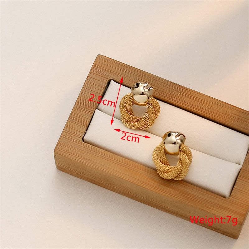 Twist Metal Stud Earrings for Women Hollow Geometric Statement Gold Color Earrings Personality Unusual Earrings Trend Brincos